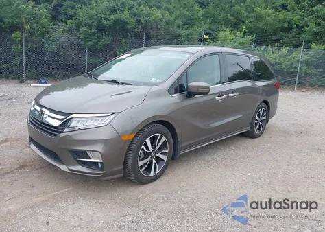 2018 Honda Odyssey Elite z USA, uszkodzony, nr VIN 5FNRL6H97JB025422
